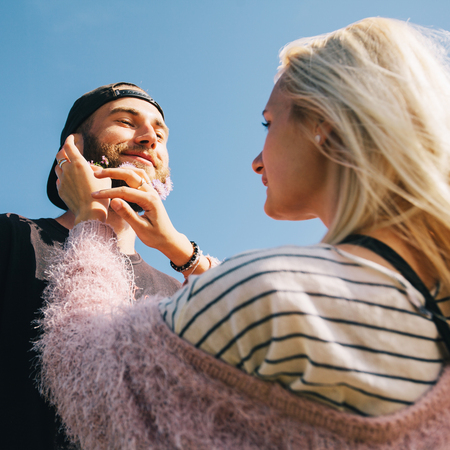 Love couple hugging and smiling outdoorsの写真素材