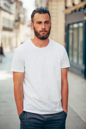 Hipster handsome male model with beard portraitの写真素材