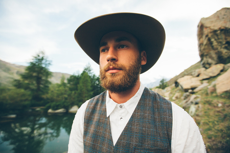 Hipster handsome male model with beard wearing trendy clothesの写真素材