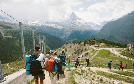 Zermatt, Switzerland - June 21, 2017: Matterhorn Mountain with white snow and blue sky in Zermatt city in Switzerland. People are hiking to the mountainのeditorial素材