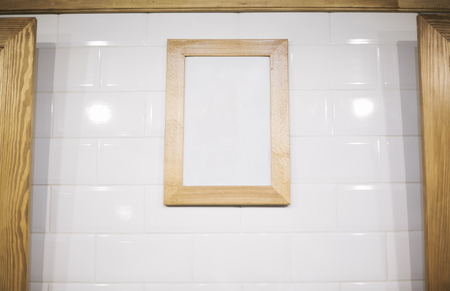 White poster on white wallの写真素材