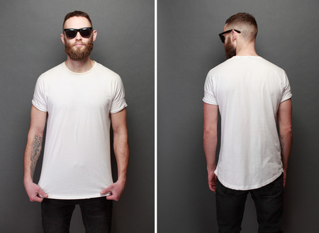 Hipster handsome male model with beard wearing white blank t-shirt with spaceの写真素材