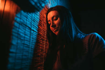 Beautiful woman portrait in neaon lights