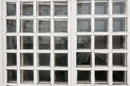 Old retro white window with glass backgroundの写真素材