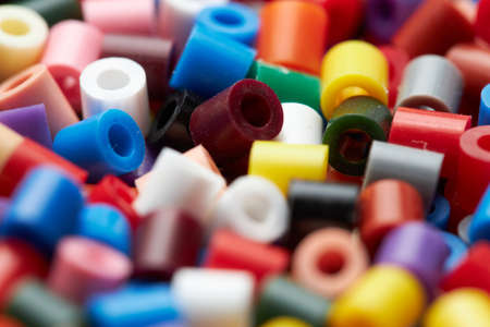 Colorful background made of plastic beadsの写真素材