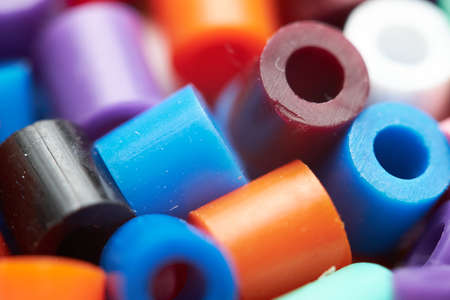 Colorful background made of plastic beadsの写真素材