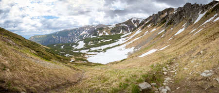 Mountains in summer. Outdoor wonderland or hiking scenery backgroundの写真素材