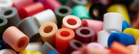 Colorful background made of plastic beadsの写真素材