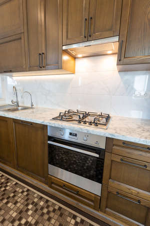 Modern kitchen oven in scandinavian interior with cooking appliances. Real imageの写真素材