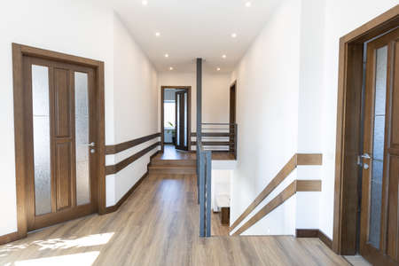 Wooden doors in modern scandinavian interiorの写真素材