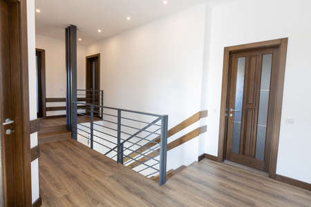 Wooden doors in modern scandinavian interiorの写真素材