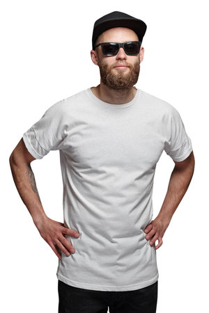 Hipster man wearing white blank t-shirt and a baseball cap isolated on white backgroundの写真素材