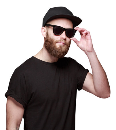 Hipster handsome male model with beard wearing black blank t-shirt and sunglasses isolated on white backgroundの写真素材
