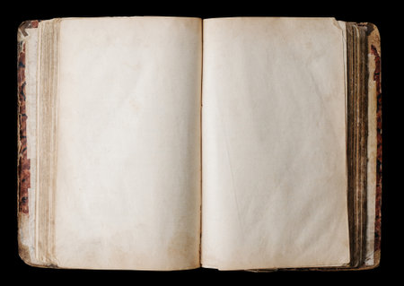 Opened retro empty book isolated on black colorの写真素材