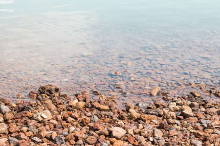 Rocks on Clear riverside, background.の写真素材