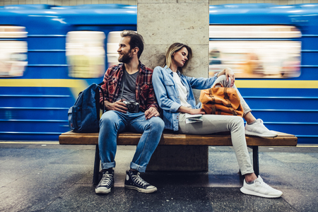 Couple of tourists is exploring new city together. Underground.の写真素材