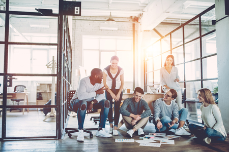Multiracial young creative people in modern office.の写真素材