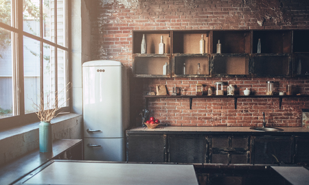Image of light wooden kitchen in the morning.の写真素材
