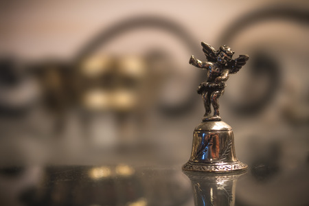 Miniature Silver Bell With Angel Macroの写真素材