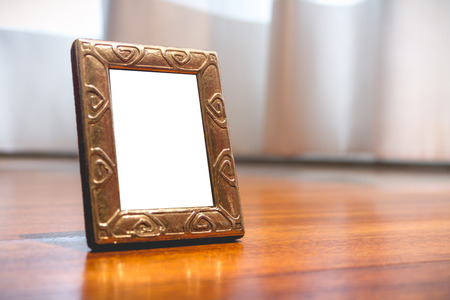 Miniature Silver Photo Frame Mock up on wooden parquetの写真素材