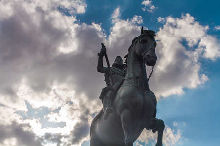 Horseman Statue In Plaza Mayor Madrid Spain, Dramatic Skyのeditorial素材
