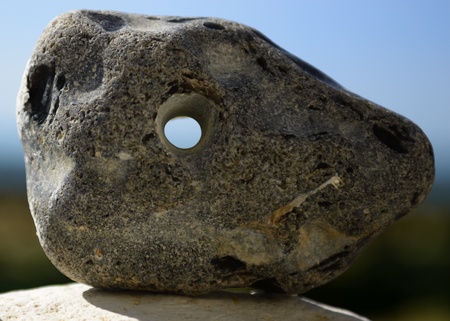 Looking through a rock with a holeの写真素材