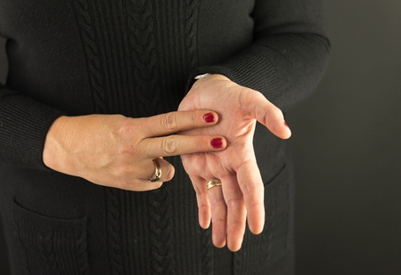 Woman Demonstrating Sign Language letter Nの写真素材