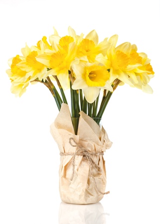 yellow daffodils in a vaseの写真素材