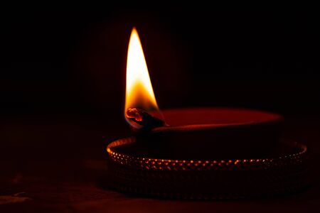 Happy diwali / karthigai deepam - Hindus religious festival - Candle flame close-up