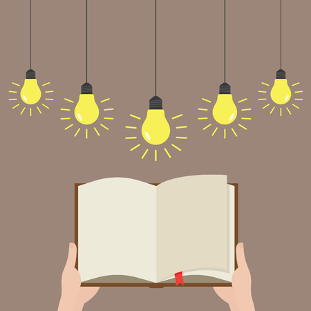 Open paper book with light bulb and business planのイラスト素材
