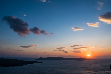 Sunset over the caldera and Nea Kameniの写真素材