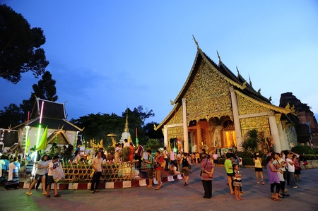 CHIANG MAI THAILAND - MAY 17 : Inthakhin traditional Offerings of flowers.People are offerings flowers to the traditional city pillar shrine. on May 17,2012 in Chiangmai Thailandのeditorial素材