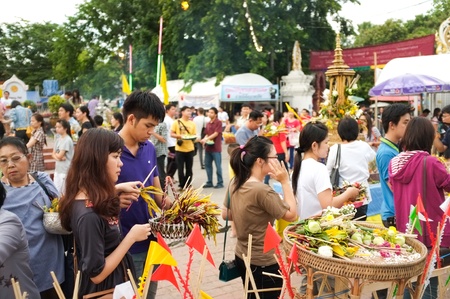 CHIANG MAI THAILAND-MAY 19 : Inthakhin traditional Offerings of flowers.Thai offering flowers attended a ceremony to worship the city pillar at Wat Chedi Luang.on May 19,2012 in Chiangmai Thailandのeditorial素材