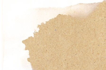 Brown colored paper abstract pattern, like water stains On white paper の写真素材