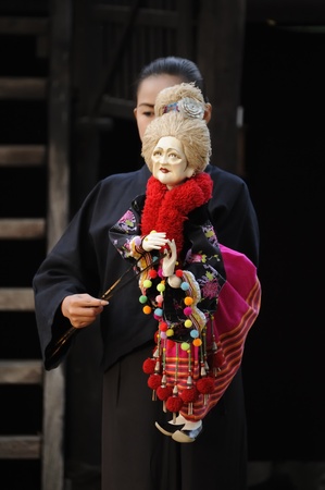 CHIANG MAI THAILAND-FEB. 23 : ASEAN Enchanting Puppets 2013.Unidentified woman Hobby hut dance gestures and pantomime Thailand at The CMU. Art Center.on FEB. 23,2013 in Chiangmai,Thailandのeditorial素材