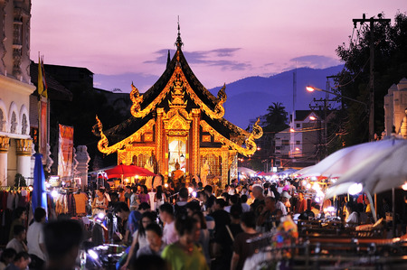 CHIANG MAI THAILAND - OCTOBER 19 : Sunday market walking street, The city center Thai temple marketing and trading of local tourists come to buy as souvenirs. on Oct. 19,2014 in Chiang Mai, Thailand.のeditorial素材