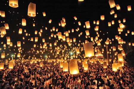 CHIANG MAI THAILAND - OCTOBER 25 : The Floating Lanterns Tudong - Khasathan festival. Tourist lights floating lanterns made of paper annually at the Sansai. on Oct. 25, 2014 in Chiang Mai, Thailand.のeditorial素材