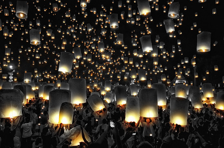 CHIANG MAI THAILAND - OCTOBER 25 : The Floating Lanterns Tudong - Khasathan festival. Tourist lights floating lanterns made of paper annually at the Sansai. on Oct. 25, 2014 in Chiang Mai, Thailand.のeditorial素材