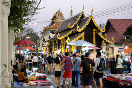CHIANG MAI THAILAND - MARCH 8 : Sunday market walking street, The city center Thai temple marketing and trading of local tourists come to buy as souvenirs. on March 8 , 2015 in Chiang Mai, Thailand.のeditorial素材