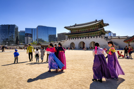 SEOUL, KOREA - OCTOBER 9, 2015 : Gyeongbokgung Palace, Unidentified women wear colorful traditional visit to the palace. The ancient architecture is elegant. and historical value of South Korea.のeditorial素材