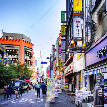 SEOUL, KOREA - OCTOBER 3, 2015 : Myeong-Dong shopping street, Korean people tourists walking shopping the neighbourhood. It is fashionable to be the most popular. neighbourhood is must when traveling.のeditorial素材