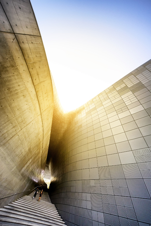 SEOUL, KOREA - OCTOBER 5, 2015 : Dongdaemun Design Plaza (DDP), Unidentified tourist visit museums of art and culture, Modern Architecture Museum Night lights are decorated around the building.のeditorial素材
