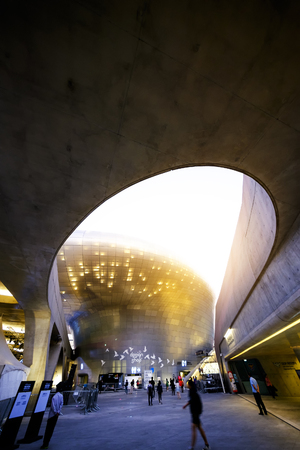 SEOUL, KOREA - OCTOBER 5, 2015 : Dongdaemun Design Plaza (DDP), Unidentified tourist visit museums of art and culture, Modern Architecture Museum Night lights are decorated around the building.のeditorial素材