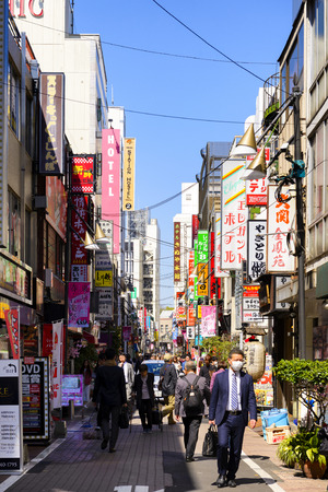 TOKYO JAPAN - MARCH 30, 2018 : Ameyoko market neighborhood, Unidentified tourists walk past this area has many shops full to shopping and restaurants. One of Tokyo's must-see places to visit.のeditorial素材