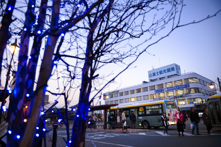 YAMANASHI JAPAN - APRIL 2, 2018 : Kawaguchiko Station, Tourists are using the tour bus service. Transportation is very convenient for both train and bus.のeditorial素材