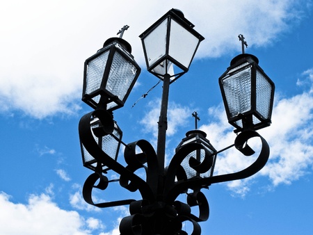 Blue sky and street lampsの写真素材