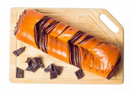 Roll chocolate on a white background