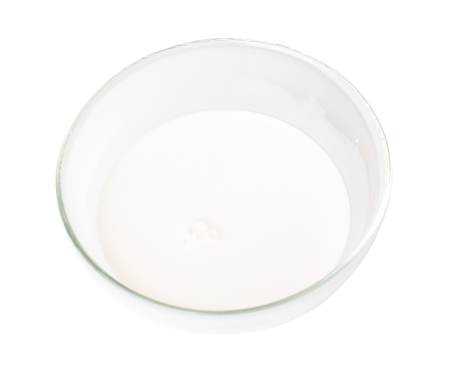 Cream in a bowl on a white backgroundの写真素材