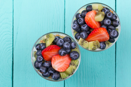 Muesli and yogurt with berriesの写真素材