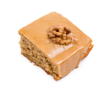 Square cake with a nut on a white background.の写真素材